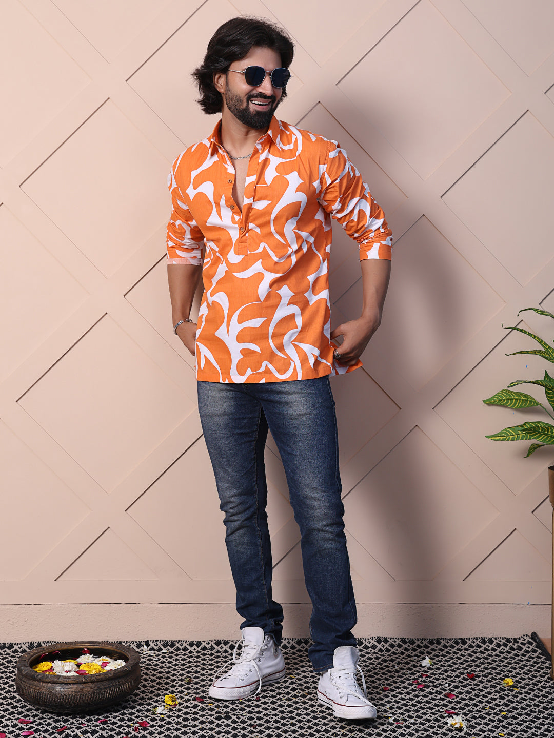 Men's printed shirt featuring a half placket & high-low hem