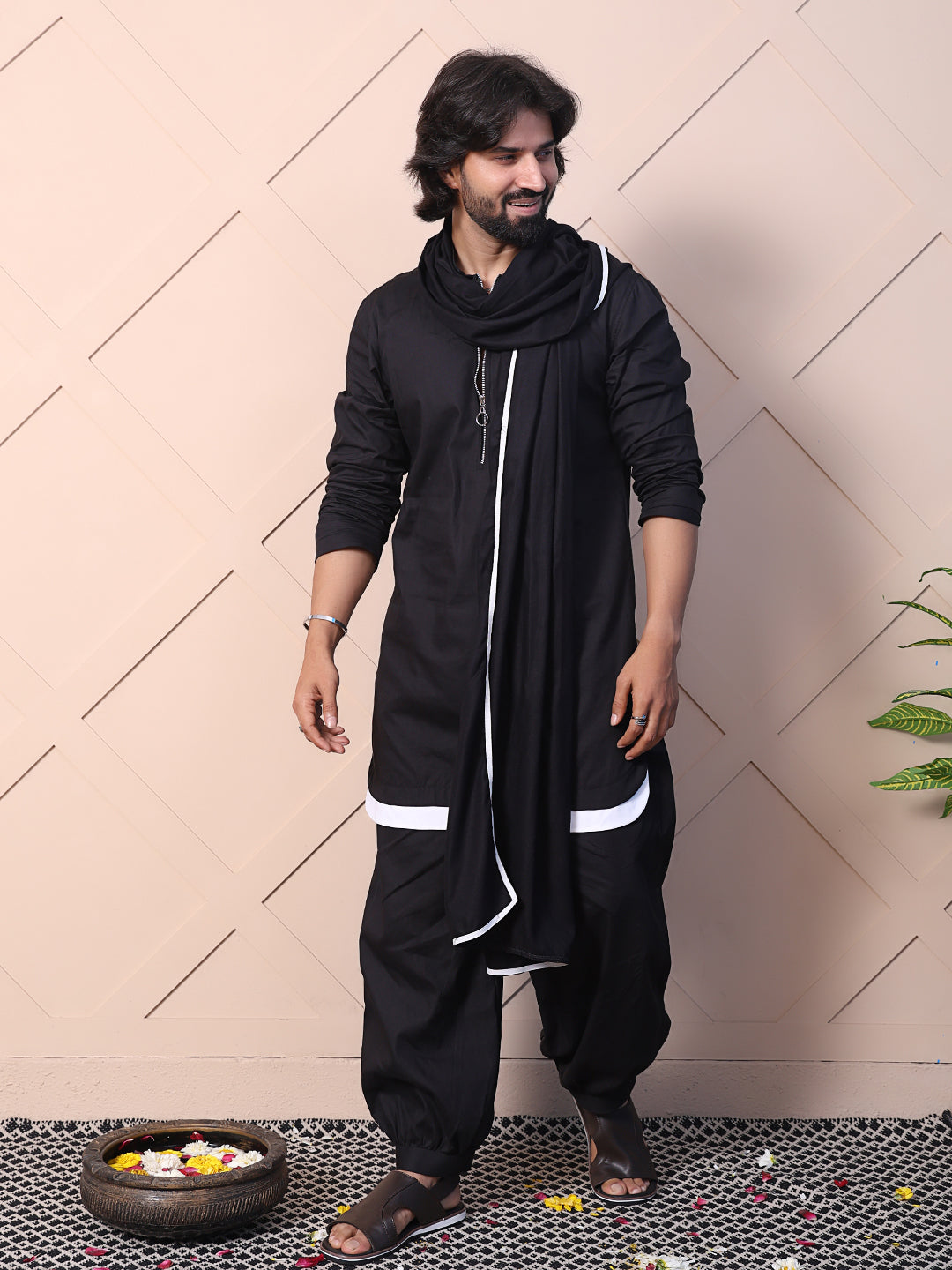 Black kurta with a rounded hem and zip closure