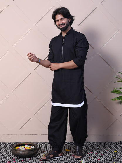 Black kurta with a rounded hem and zip closure