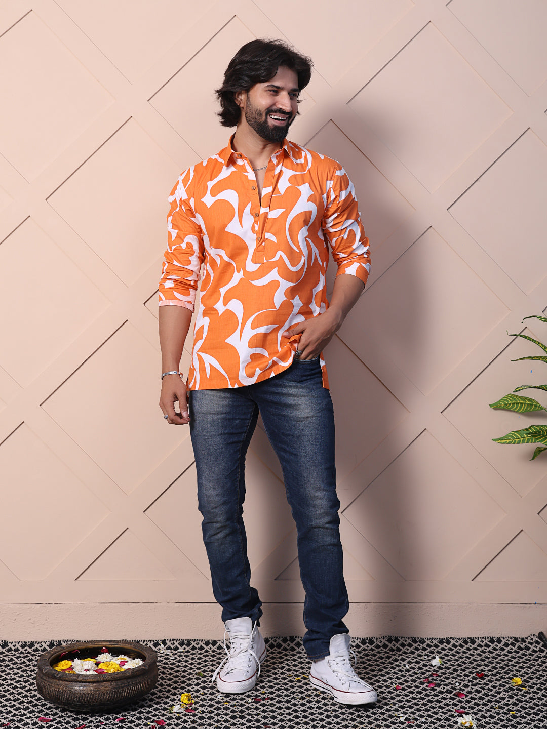Men's printed shirt featuring a half placket & high-low hem