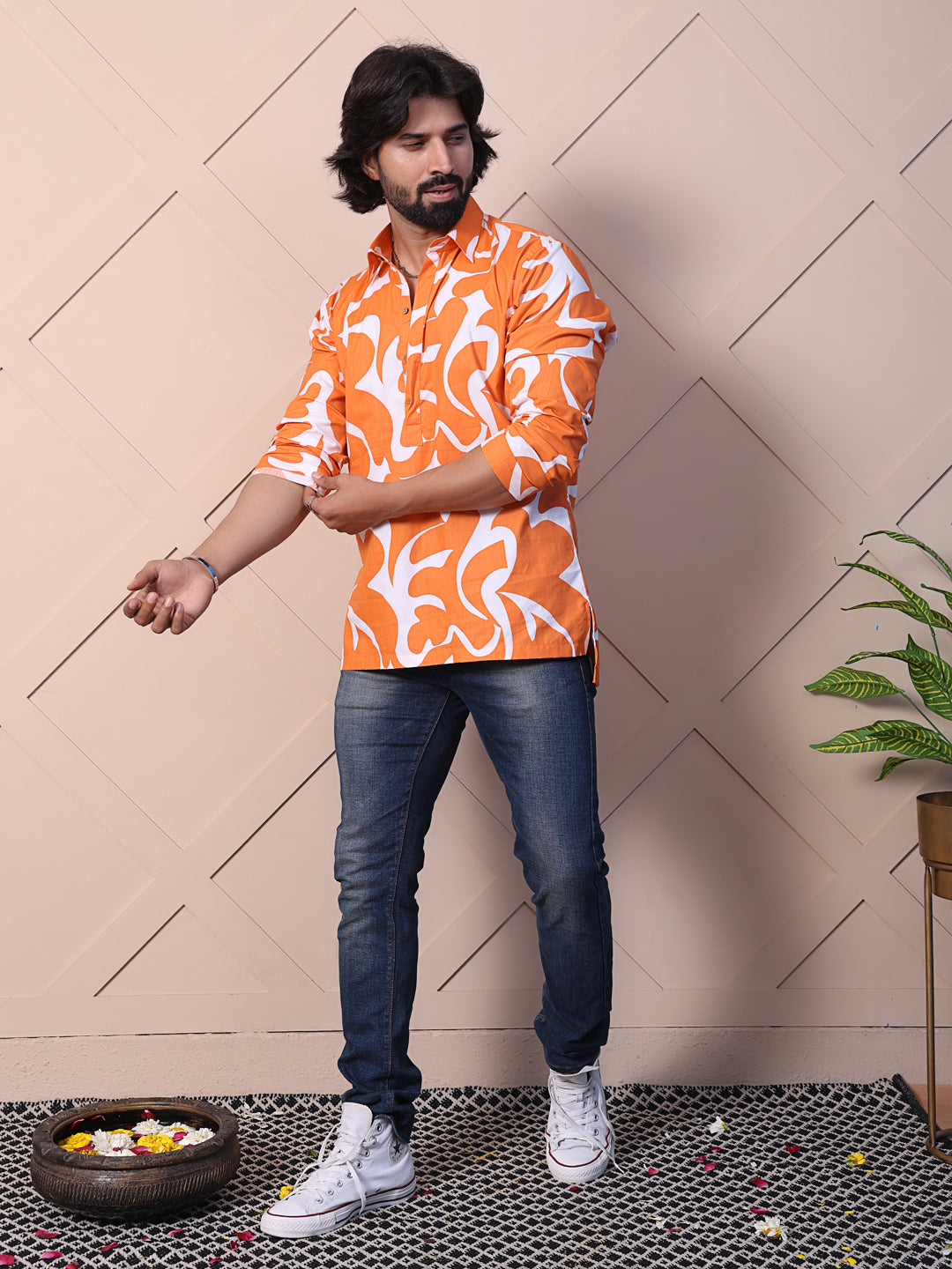 Men's printed shirt featuring a half placket & high-low hem