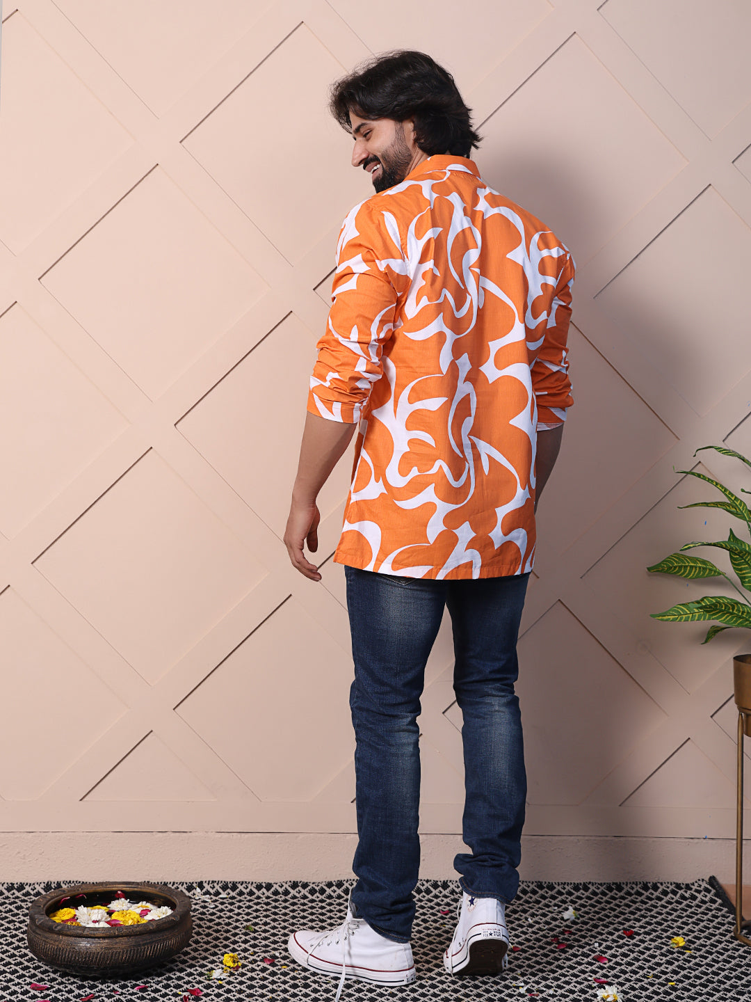 Men's printed shirt featuring a half placket & high-low hem