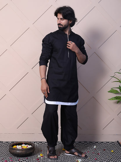 Black kurta with a rounded hem and zip closure