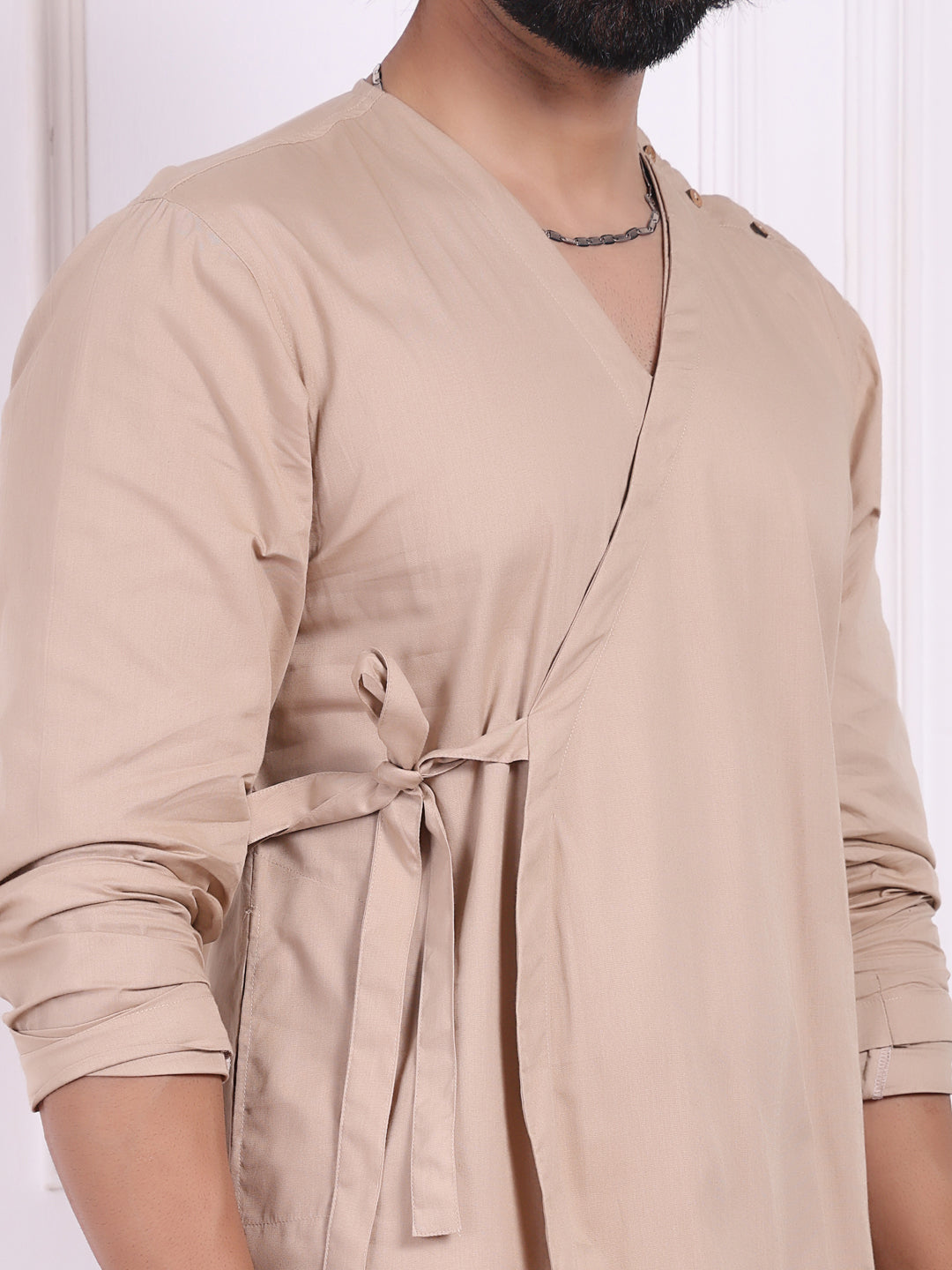 Beige layered kurta with V-neck and belt accent