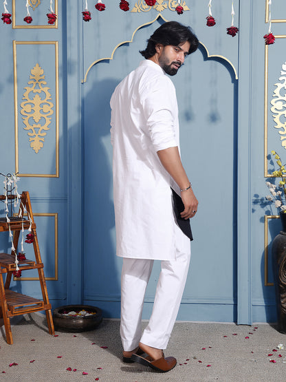 White kurta with mandarin collar and black hem