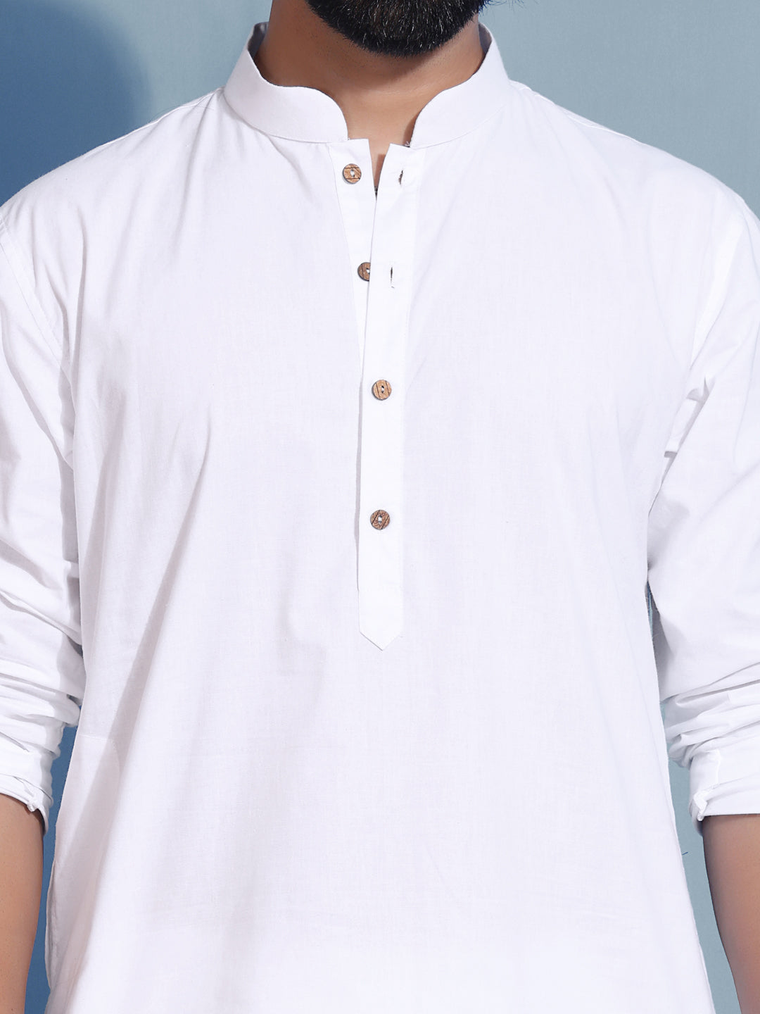 White kurta with mandarin collar and black hem